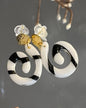 Pendientes espiral negros y blancos con dorado RIC01